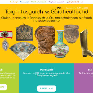 The Gaelic-language homepage of the Museum of the Highlands website. Images of a diverse range of museum objects are scattered underneath the text "Taigh-tasgaidh na Gàidhealtachd".